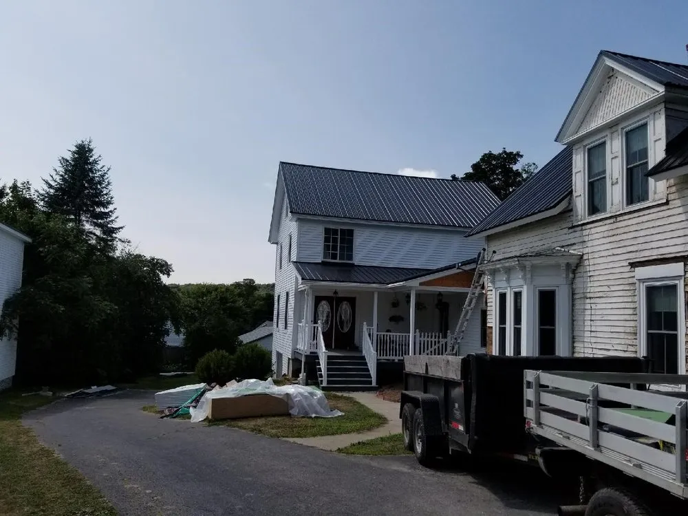 Slide of Mansir's Roofing & Siding