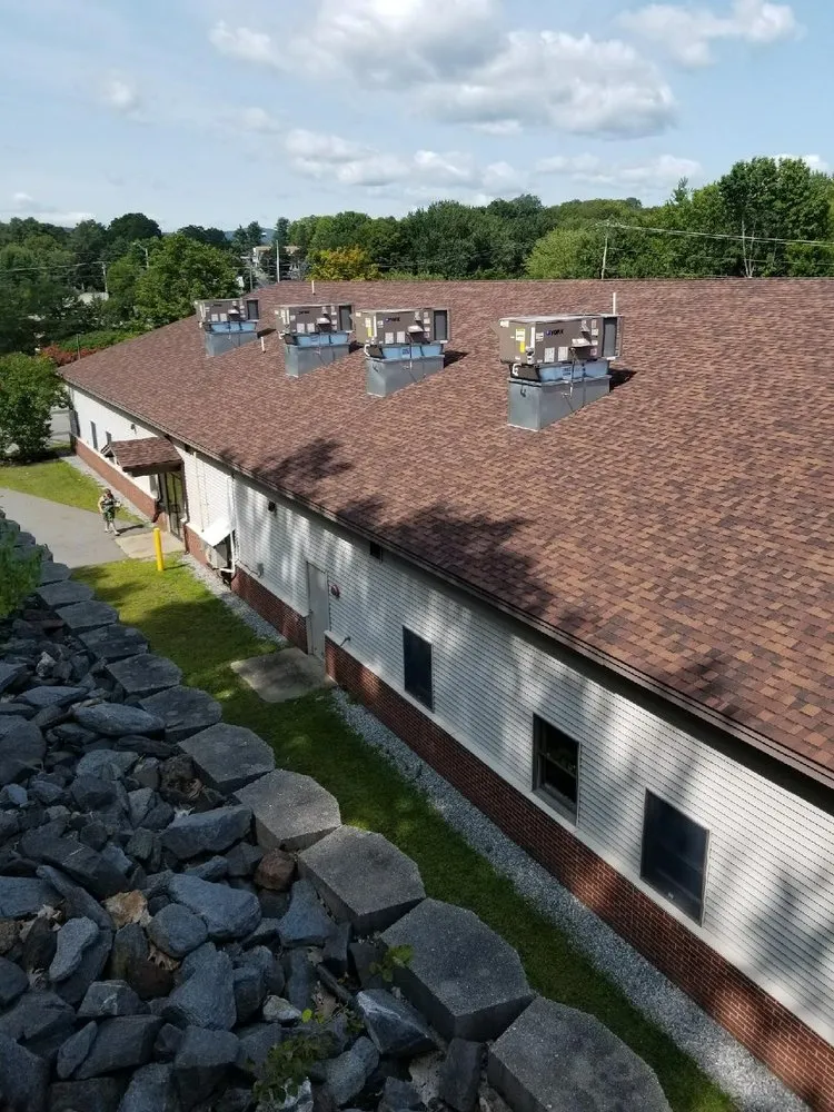 Slide of Mansir's Roofing & Siding