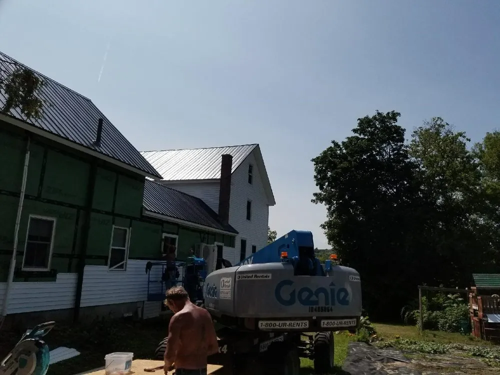 Slide of Mansir's Roofing & Siding