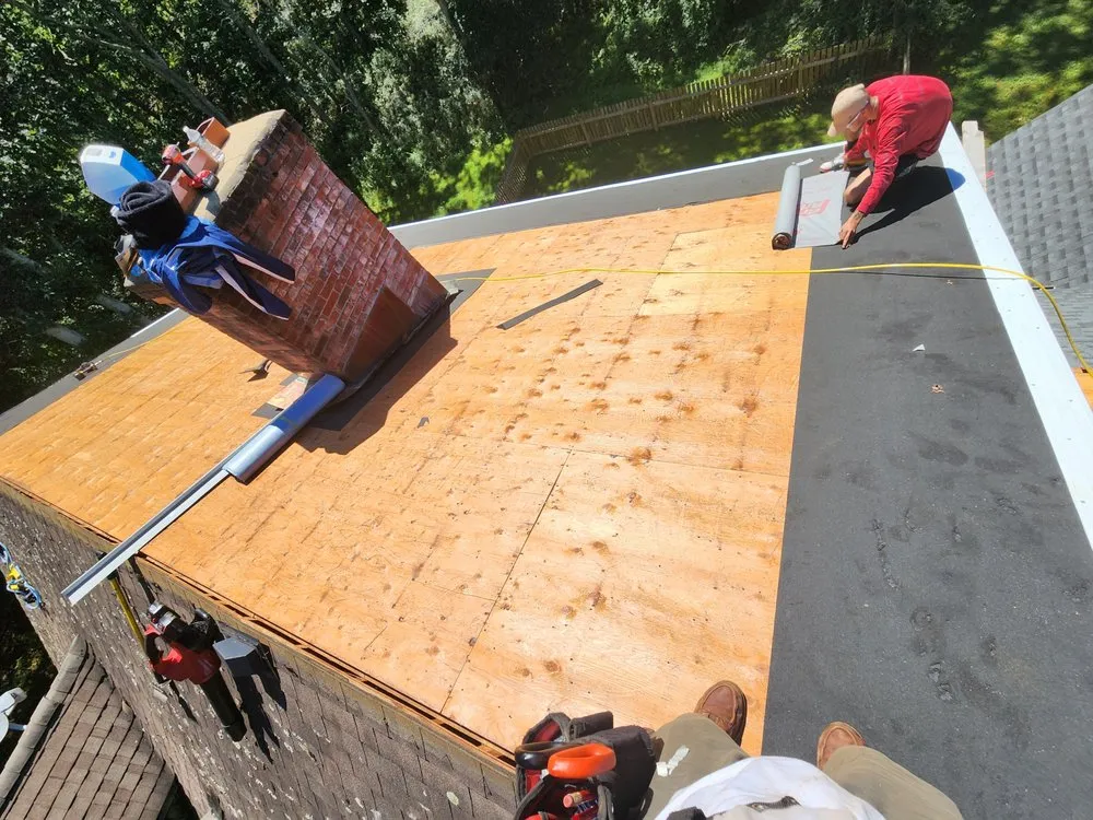 Slide of Manzone Roofing & Construction