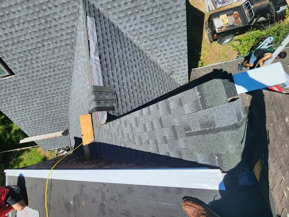 Slide of Manzone Roofing & Construction