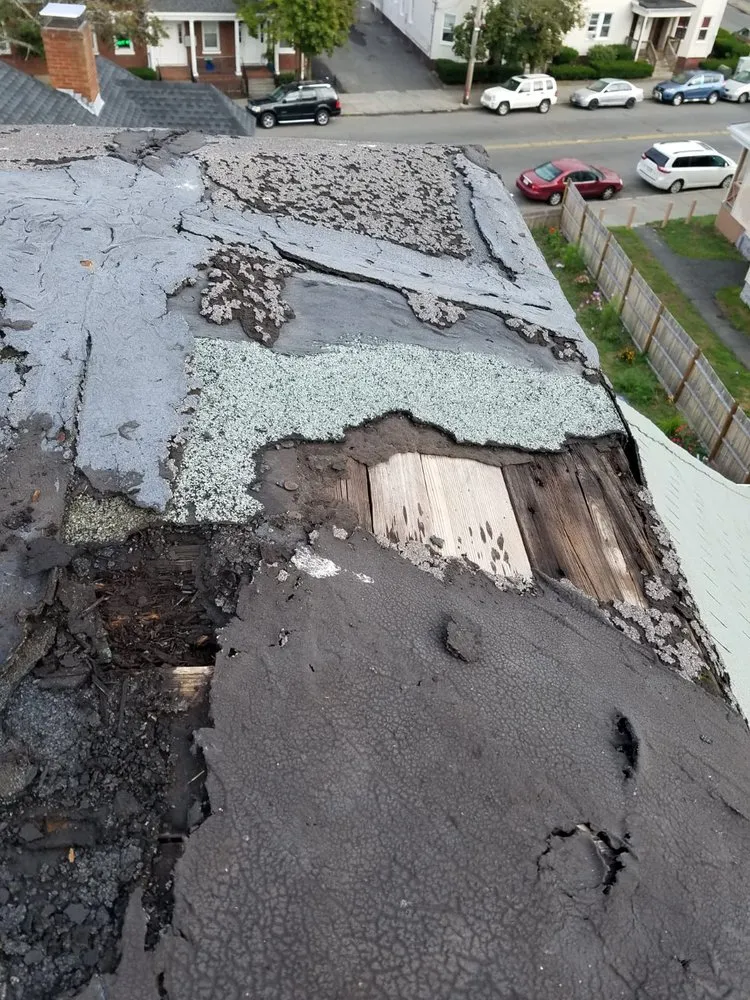 Slide of Marcello Roofing