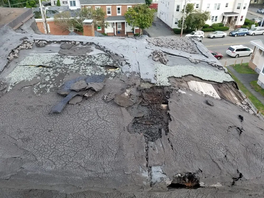 Slide of Marcello Roofing