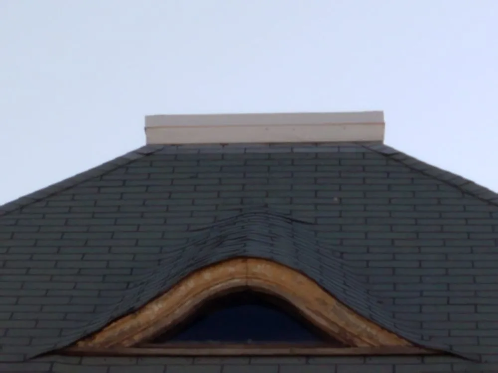 Slide of Marcello Roofing