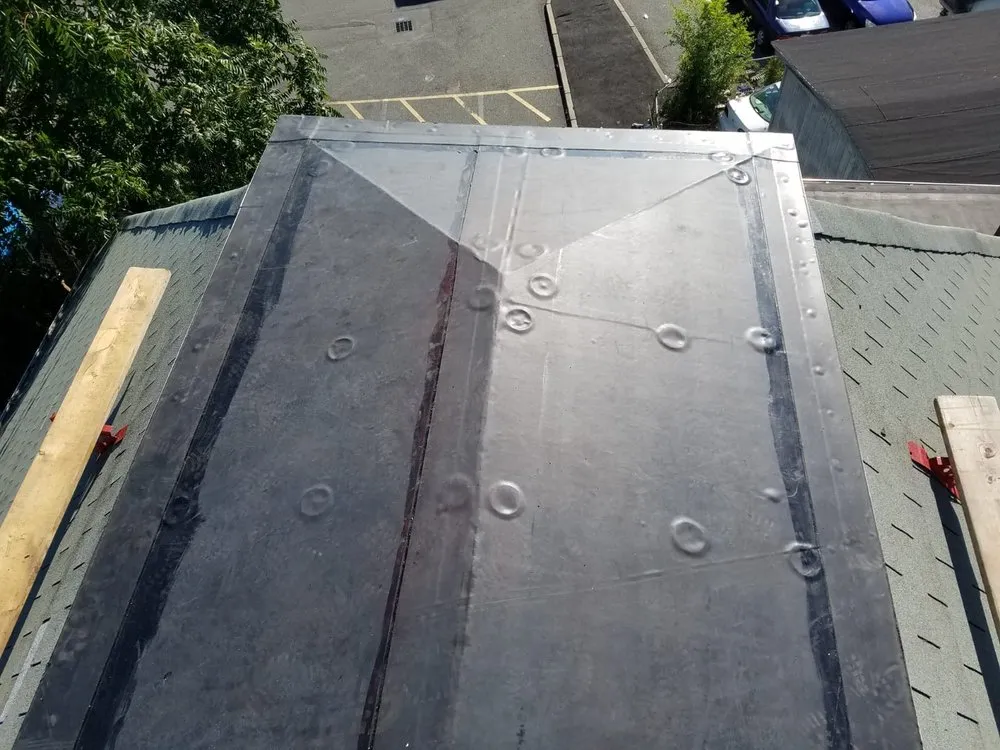 Slide of Marcello Roofing