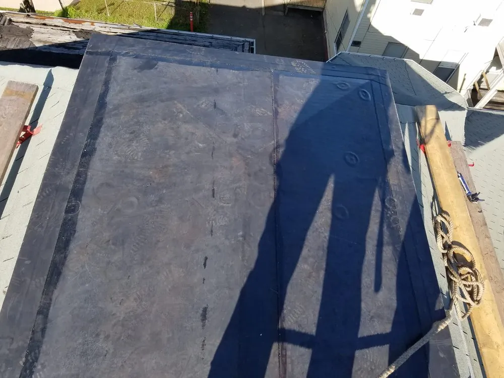 Slide of Marcello Roofing