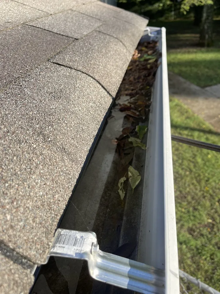 Slide of Marcus Gutters Cleaning