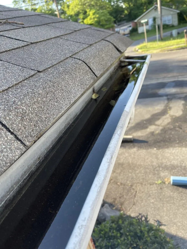 Slide of Marcus Gutters Cleaning