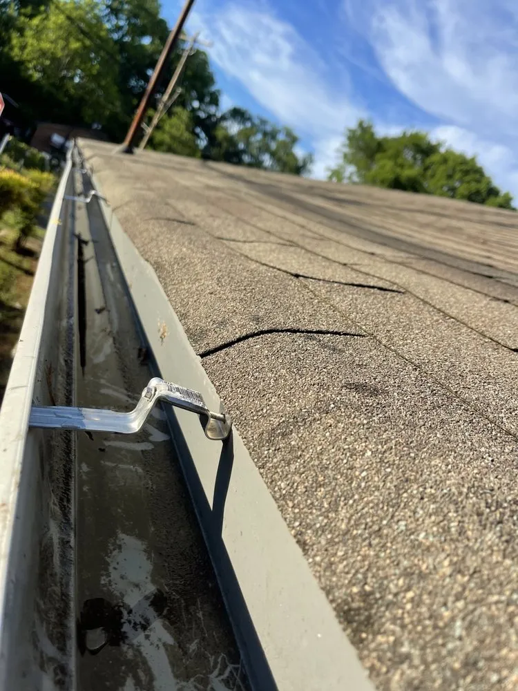 Slide of Marcus Gutters Cleaning