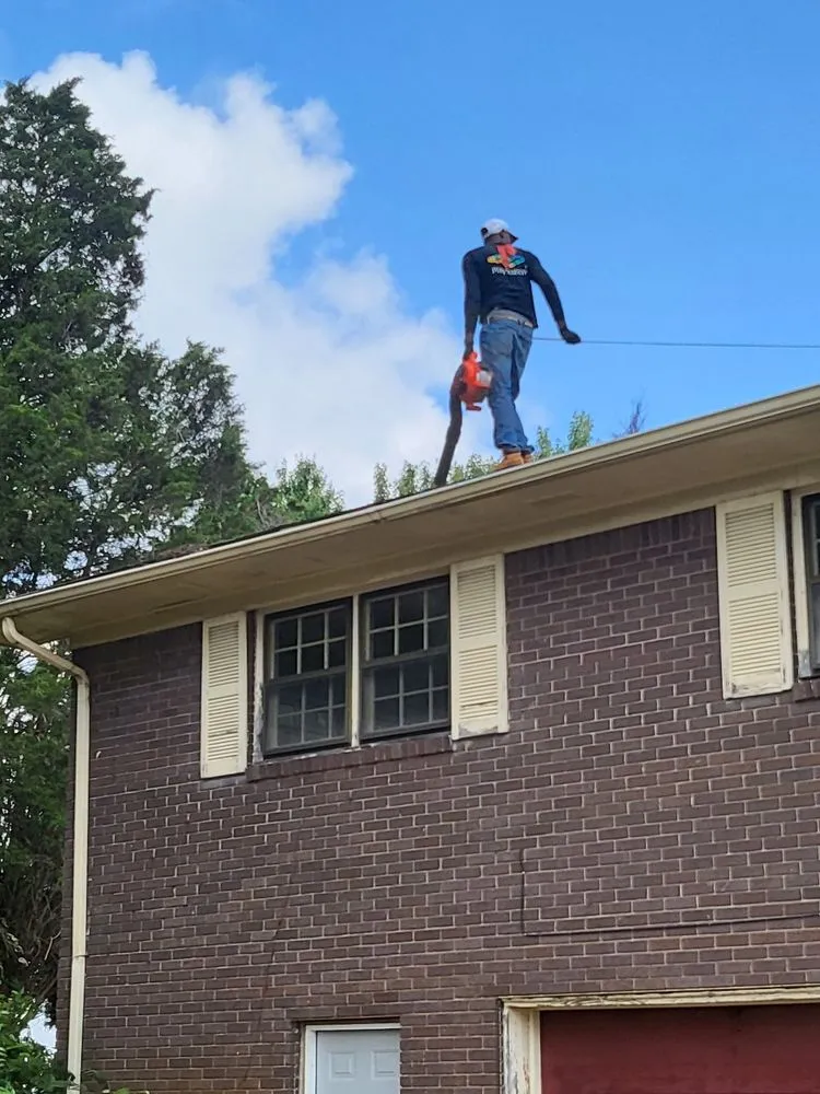 Slide of Marcus Gutters Cleaning