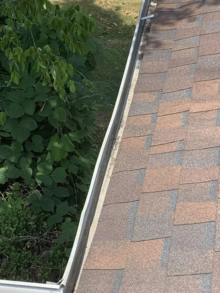 Slide of Marcus Gutters Cleaning