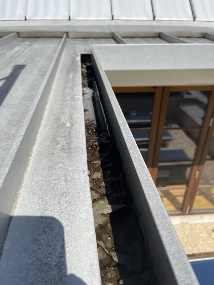 Slide of Marcus Gutters Cleaning