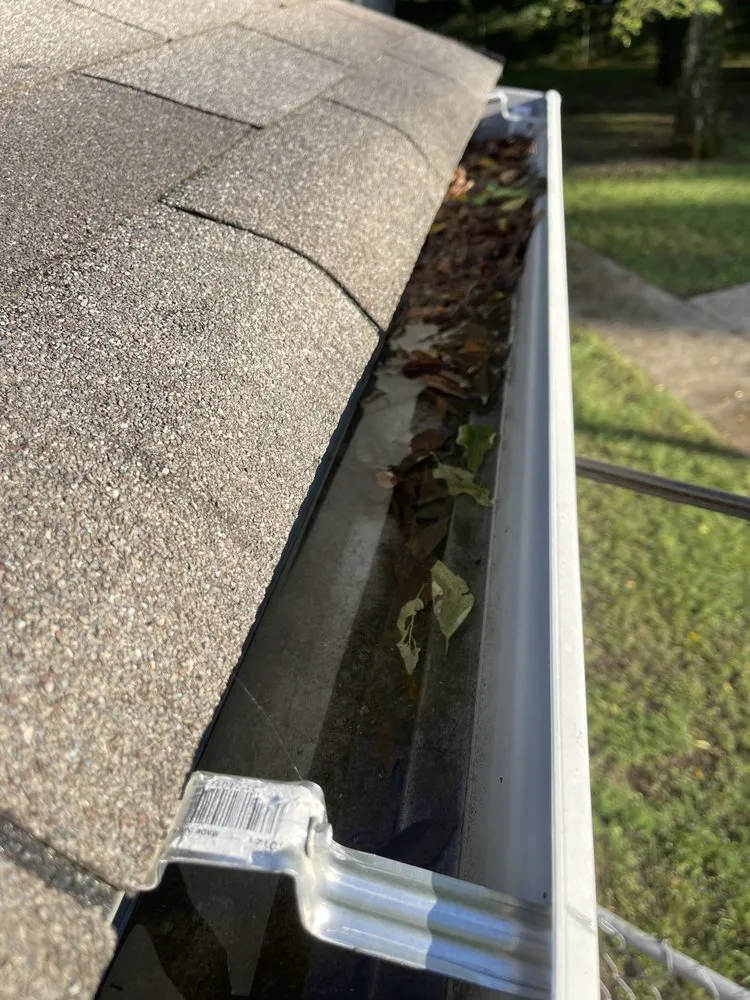 Slide of Marcus Gutters Cleaning