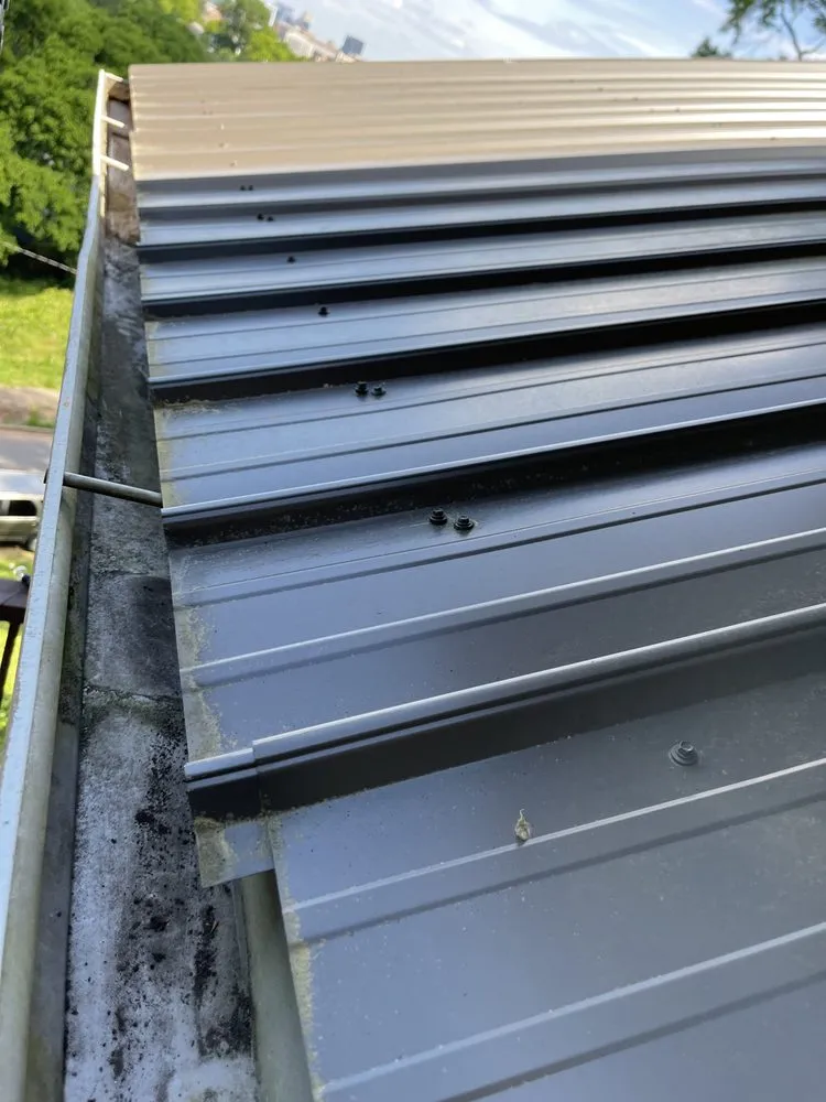 Slide of Marcus Gutters Cleaning