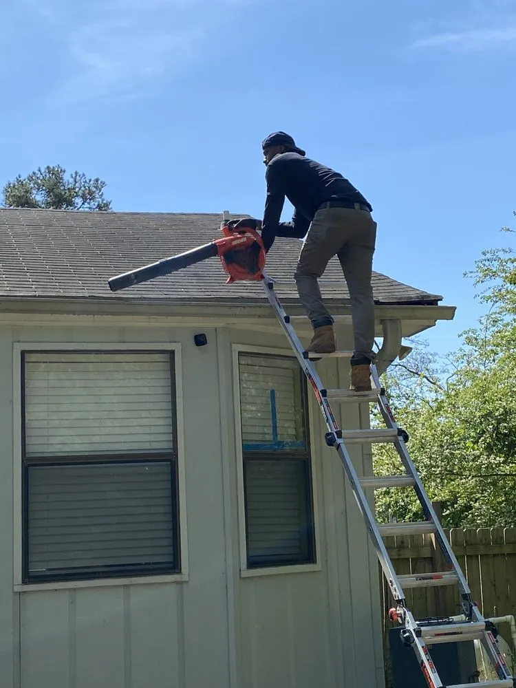 Slide of Marcus Gutters Cleaning