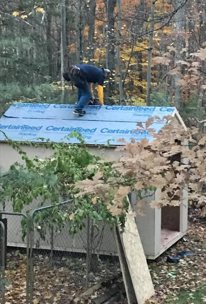 Local roof leak repair in Williamsburg, MI by Mariage Roofing Company