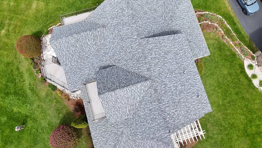 Expert roof leak repair near you in Williamsburg, MI by Mariage Roofing Company