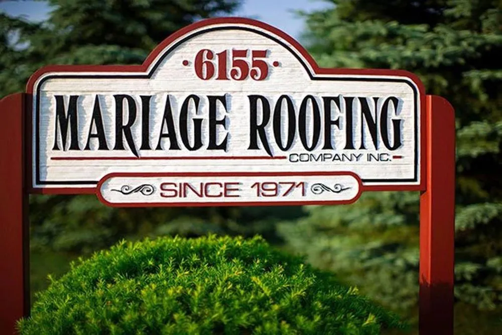 Professional roof repair for residential properties in Williamsburg, MI by Mariage Roofing Company