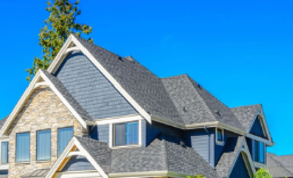 Emergency storm damage roof repair experts serving Williamsburg, MI - Mariage Roofing Company