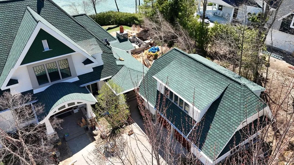 Local roof replacement in Williamsburg, MI by Mariage Roofing Company