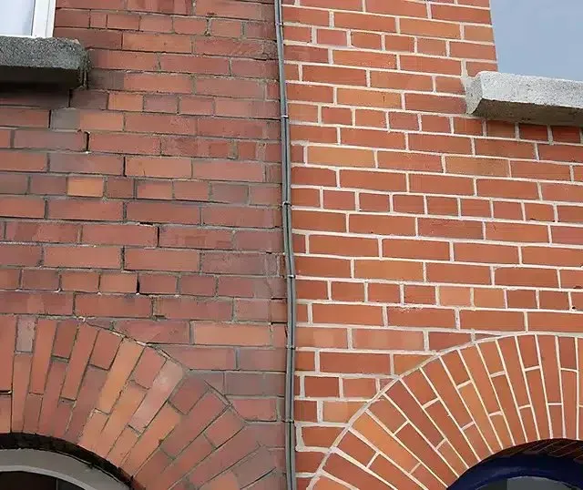 Slide of Mario’s roofing and masonry