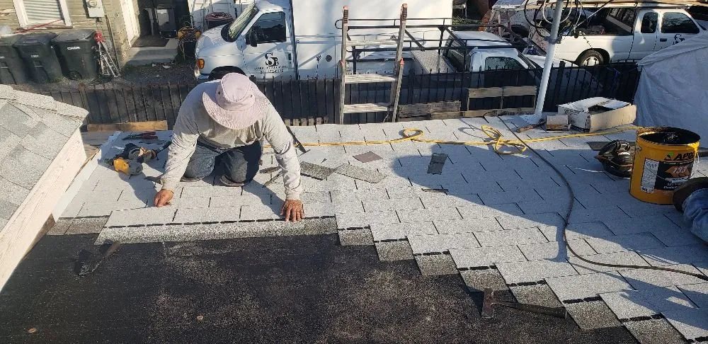 Slide of Mario's Roofing Services