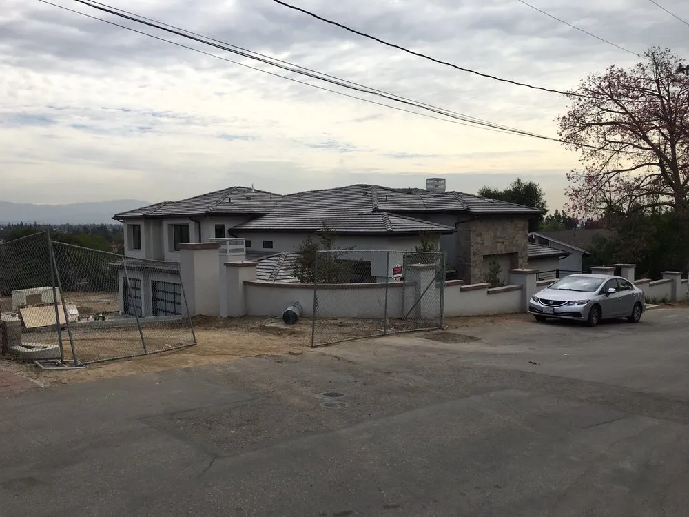 Slide of Mario's Roofing Services