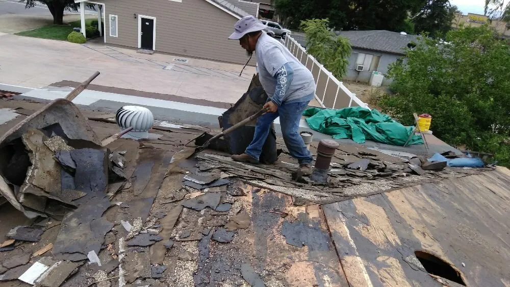 Slide of Mario's Roofing Services