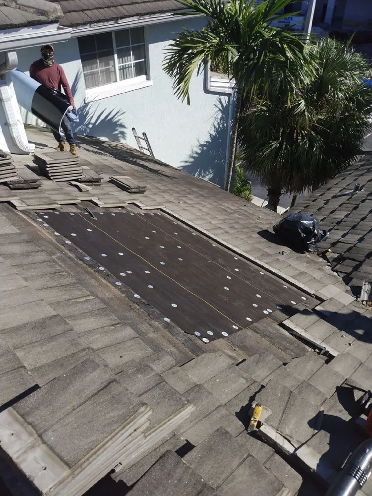 Slide of Marios Roofing