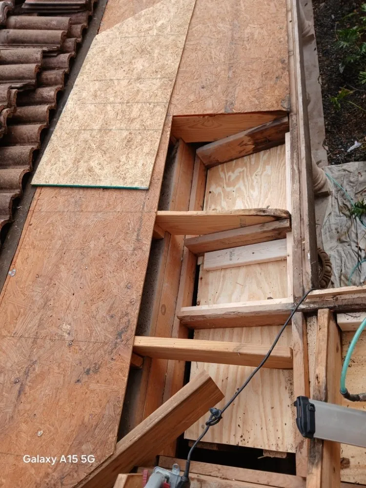 Slide of Mark Roofing Construction