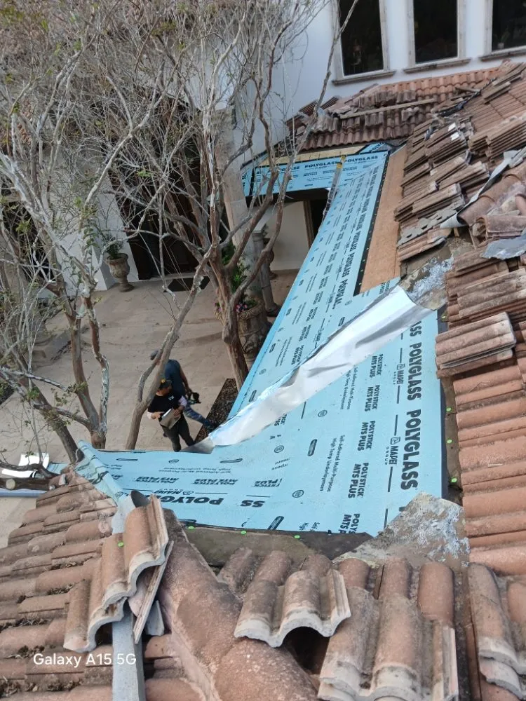 Slide of Mark Roofing Construction