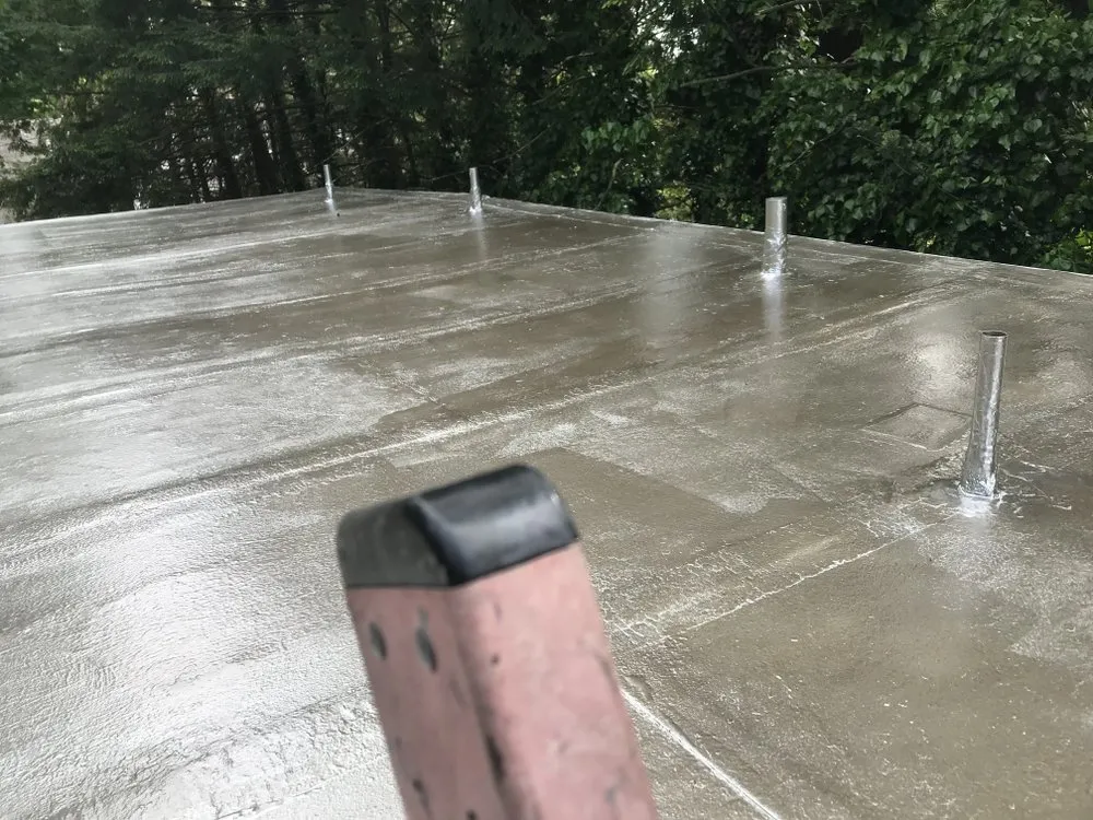 Slide of Markou Roofing