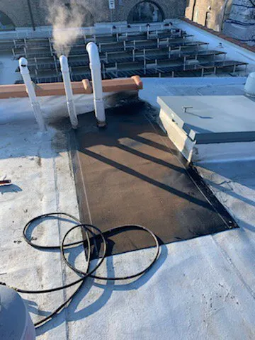 Slide of Markowicz Roofing