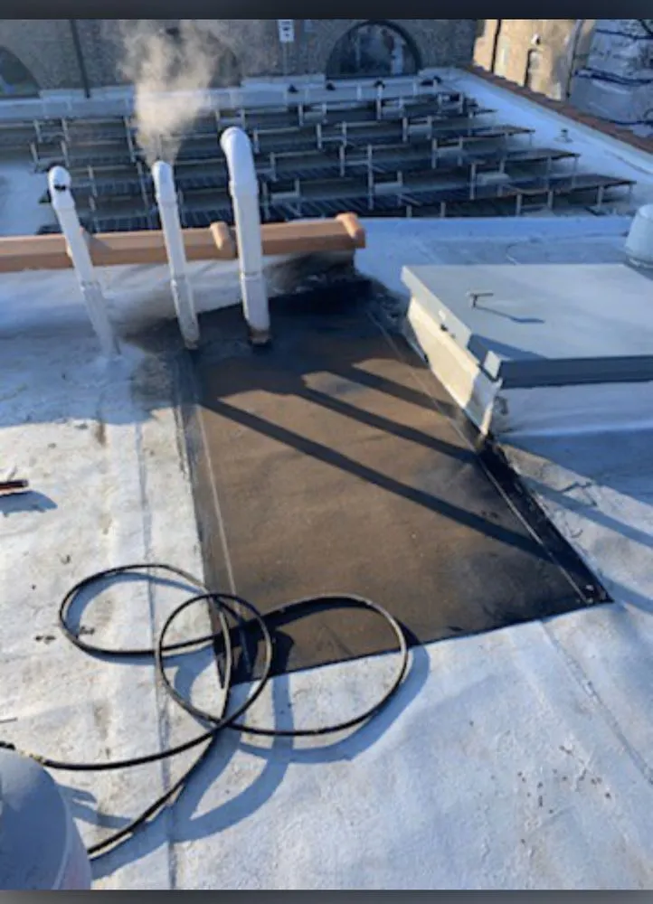 Slide of Markowicz Roofing