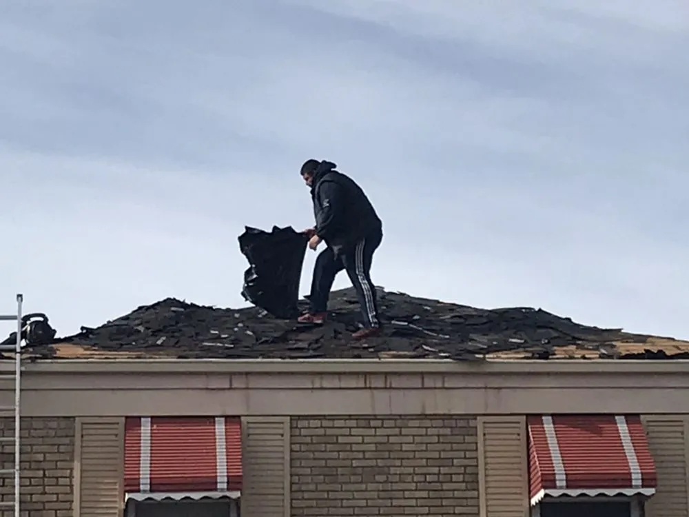 Slide of Markowicz Roofing