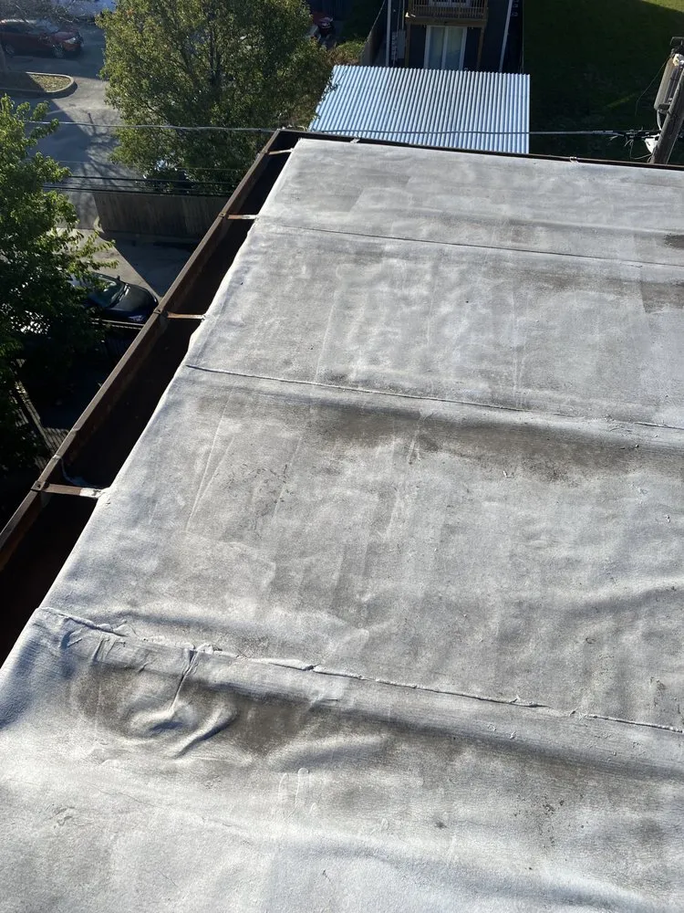 Slide of Marks Roofing and Construction