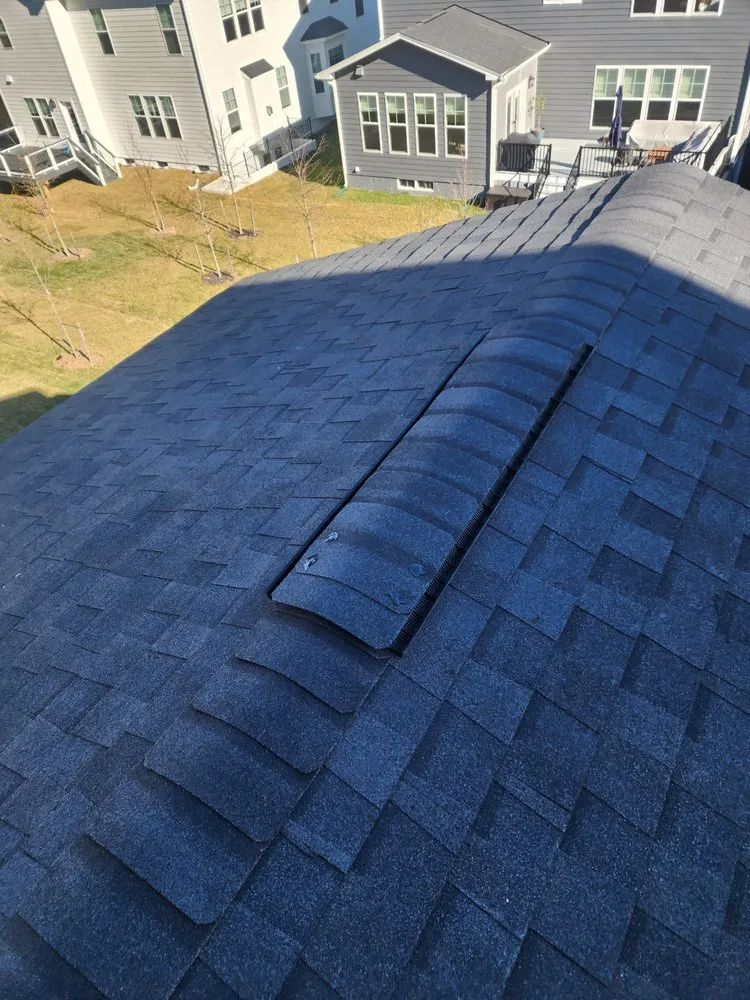 Slide of Marquez Roofing