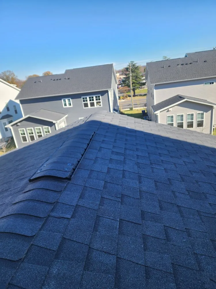 Slide of Marquez Roofing