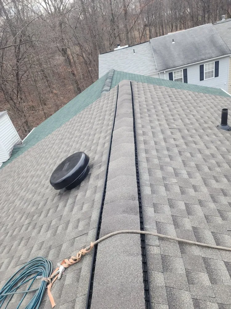 Slide of Marquez Roofing