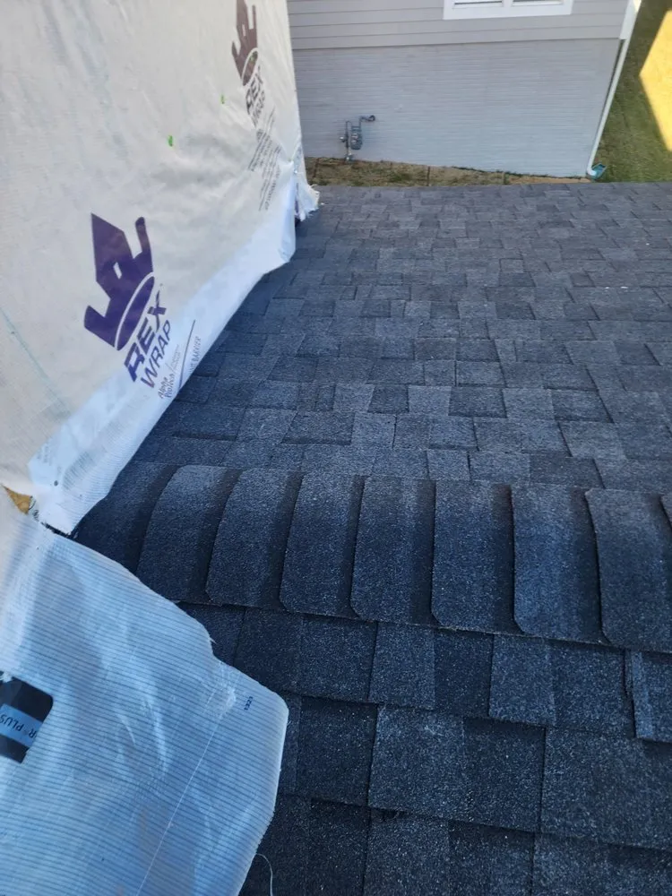 Slide of Marquez Roofing