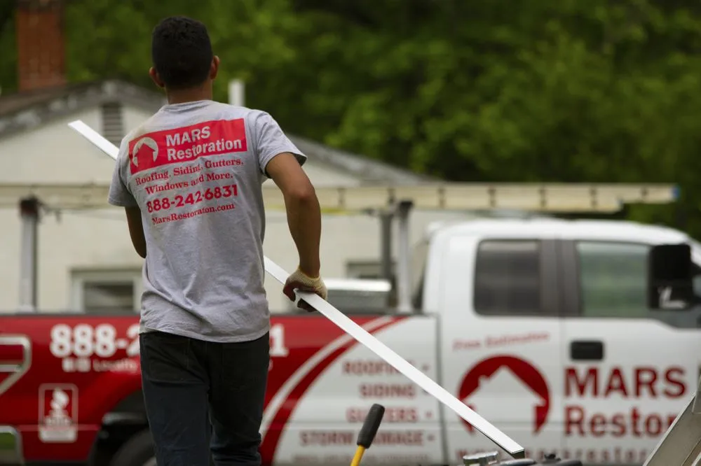 Slide of MARS Roofing
