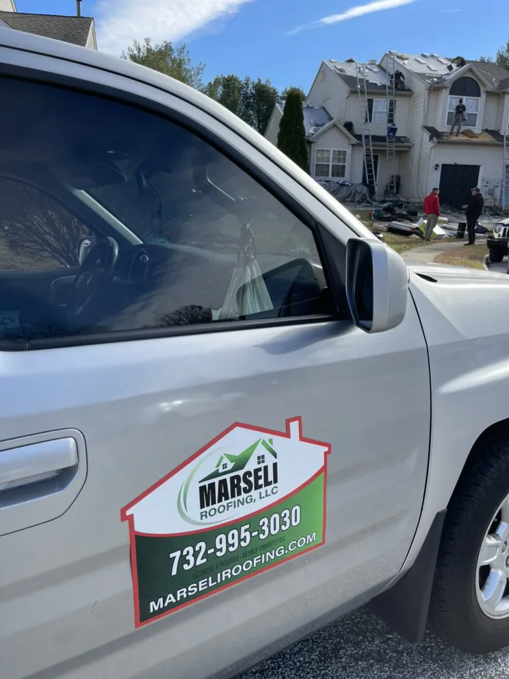 Slide of Marseli Roofing