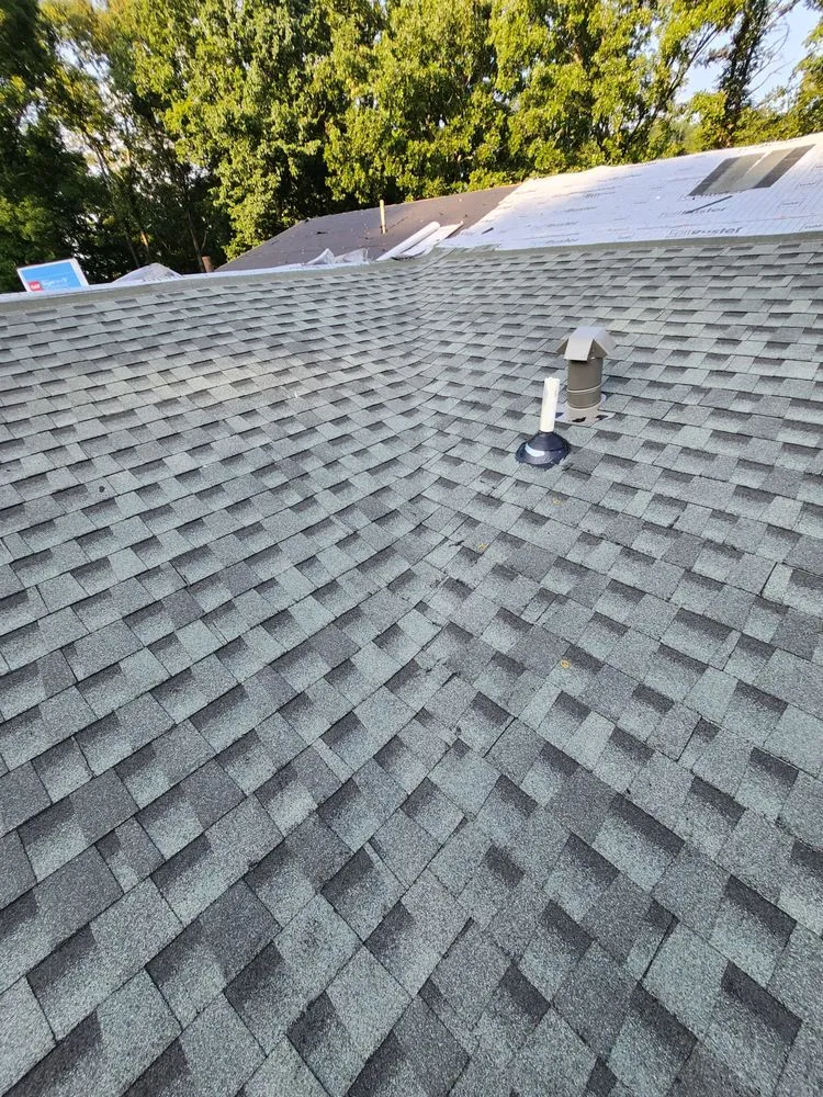 Slide of Marshall Roofing and Remodeling