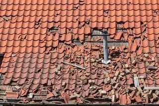 Slide of Marshall Roofing