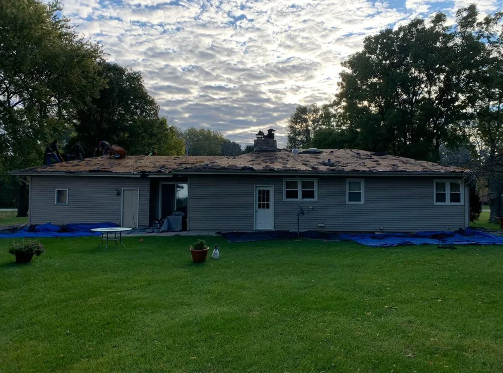 Slide of Martin Exteriors Roofing & Siding