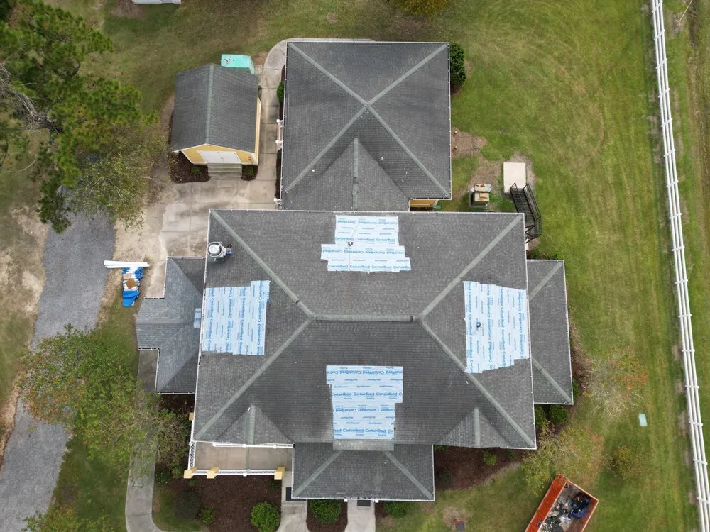 Slide of Martinelli Roofing