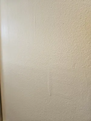 Martinez Painting And Roofing Logo