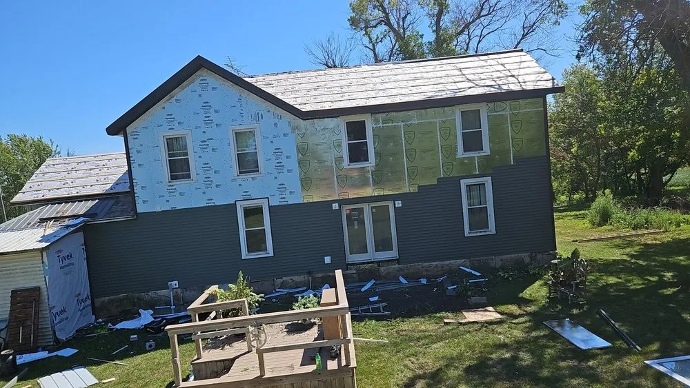 Reliable storm damage roof repair experts serving Elma, IA - Martins construction ll