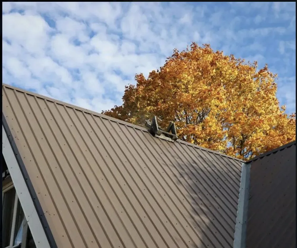 Slide of Martin's Steel Roofing