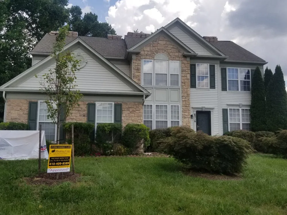 Licensed storm damage roof repair in Lutherville-Timonium, MD by Maryland Building Corp